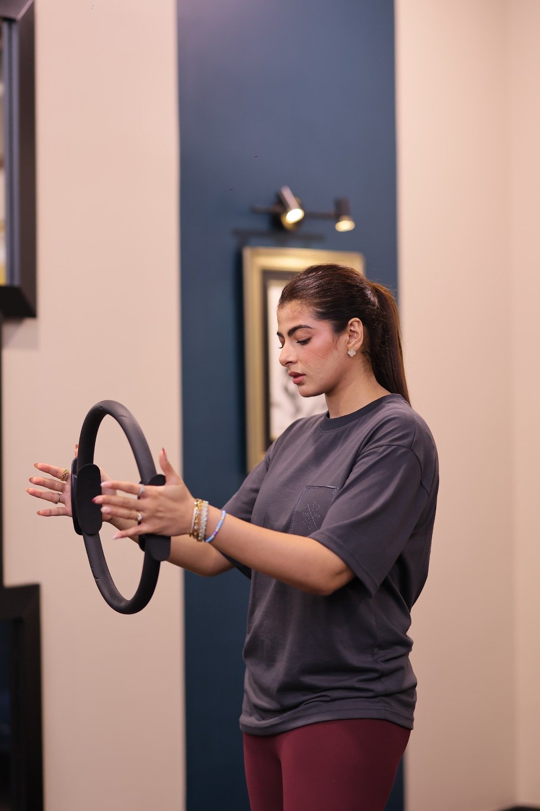 Nahal Sameer practicing with a Pilates ring